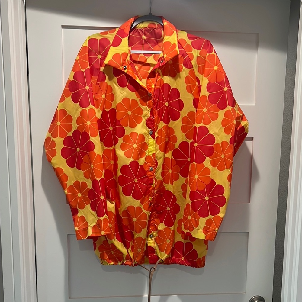 Vibrant Flower Power Vintage Rain Jacket.